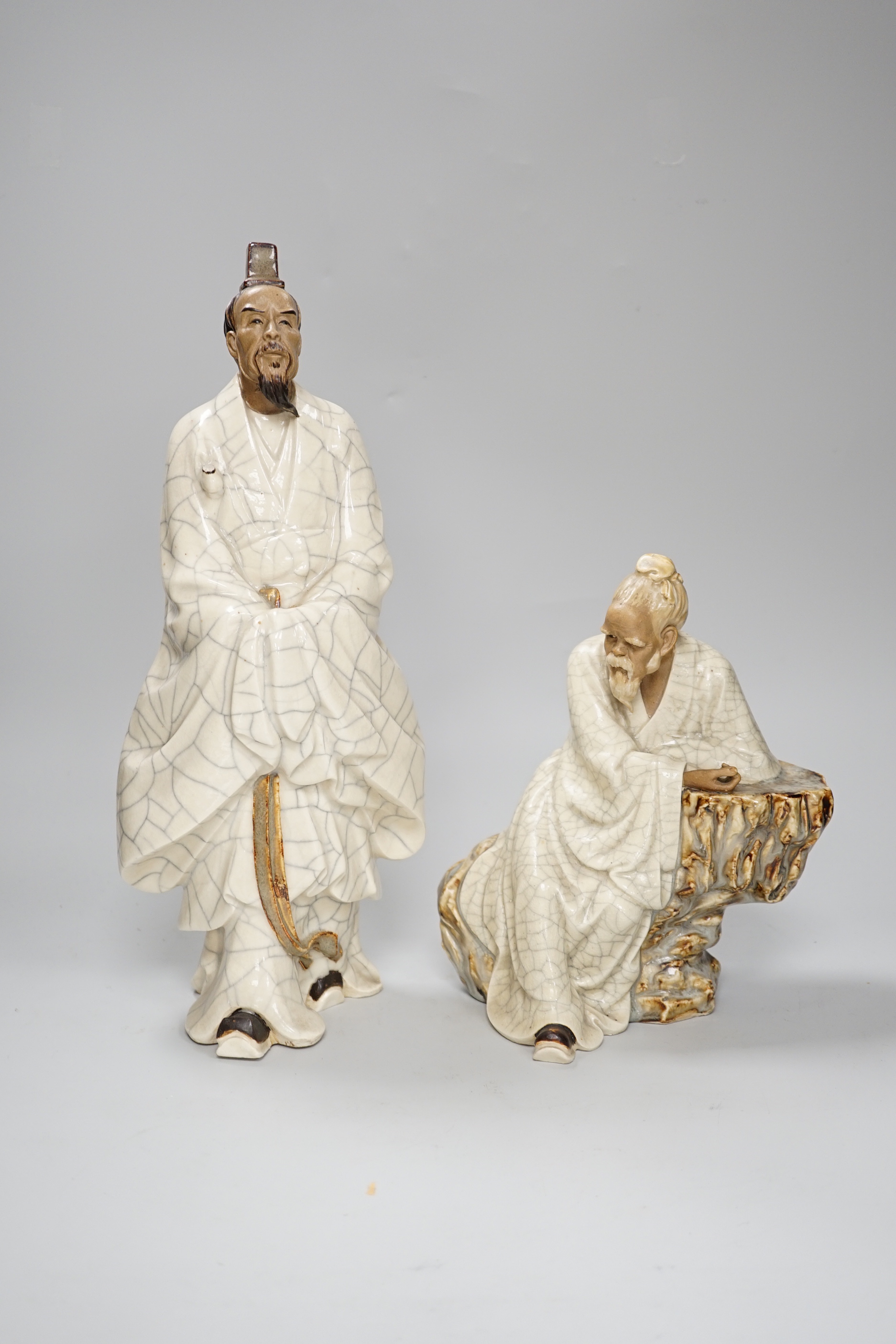 Two large Chinese Shiwan pottery figures and a vase, tallest 35cm